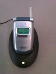 Sprint Lg TP5250 Working Chargers & Flip Phone For Parts Genuine Leather Case. Fixed Price $99.00.