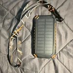 Riapow Solar Power Bank 26800MAH T11W Qi Rechargeable Usb Ports Flashlight. Fixed Price $11.99.