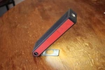 Red Helio Premium Solar Led Flashlight & Power Bank - MAKERS4GOOD. Fixed Price $10.00.