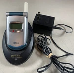 Powers Lg Sprint Pcs TP5250 Flip Phone W/ DC-46W Desktop Charging Base. Fixed Price $39.95.