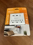 Merkury Innovations 2.1 Amp Wall Charger, Outlets With 3 Usb Charging Ports. Fixed Price $9.95.
