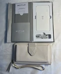 Motile 3,000 Mah Qi Certified White Wireless Power Bank Charger And Clutch. Fixed Price $9.99.
