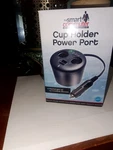 The Smart Commuter Cup Holder Power Port Simultaneously Recharges 4 Devices. Fixed Price $25.00.