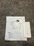 10000MAH Power Bank PB147AC Plug/built-in Charging Cable (white). Fixed Price $32.99.