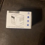 International Power Plug Adapter - Travel White W/4 Usb Ports. Fixed Price $7.00.