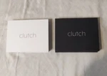 2 Clutch - Portable Iphone Charger Black And White 14 Older.. Fixed Price $39.00.