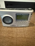 Sharper Image Travel Soother 20 Radio Alarm Clock - No Power Adapter. Fixed Price $40.00.
