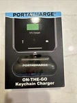Portacharge Portable Phone Charger On-the-go Keychain Black Brand New. Fixed Price $10.00.