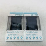 Pack Voltzy Portable Solar Power Bank 8000MAH 2X Usb, Ic Chip, Water Resistant. Fixed Price $29.98.