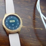 Samsung Galaxy Bluetooth Smart Watch Model EP-Y0805 Rose Gold W/ Pink Band. Fixed Price $49.00.
