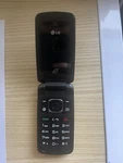 / - Black ( Tracfone ) Small Cellular Flip Phone. Fixed Price $9.99.