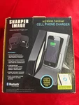 Sharper Image Wireless Handset Cell Phone Charger. Fixed Price $15.00.