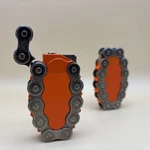 One World Refillable Butane Harley Orange Motorcycle Chain Cigarette Lighter (2). Fixed Price $25.00.