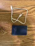 Ultra Slim Battery Pack Blue Wallet Size In Great Condition. Fixed Price $12.00.