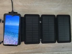 Survival Frog Quadrapro Solar Power Bank 6500MAH Wireless Qi Charger Foldable Us. Fixed Price $34.99.