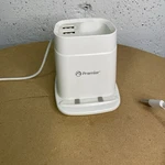 Used White Premier Phone Docking Charging Station With Duel Usb & Pencil Holder. Fixed Price $10.00.