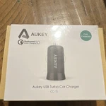 Aukey Usb Turbo Car Charger CC-T5 Black Qualcomm Quick 2.0. Fixed Price $8.00.