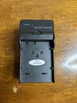 Digital Video Battery Compact Travel Charger, Dc Input. Model XB-168A1. Fixed Price $9.99.