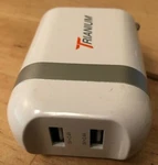 Trianium Wall Charger Dual Usb Power Supply 5V 2.4A X2 TM000109. Fixed Price $17.08.