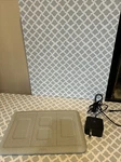 Phone Charger Halo 4-IN-1 Wireless Charging Mat Silver. Fixed Price $16.99.