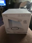 One Products OPLU001 Uv Sanitizer & Fast Qi Wireless Charger White. Fixed Price $10.00.