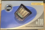 Vintage Palm M100 Handheld Pda W Folding Travel Cradle, Cable, Stylus, Manual.... Fixed Price $45.00.