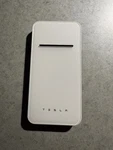 White Tesla Wireless Portable Charger Power Bank TLA-101. Fixed Price $30.00.